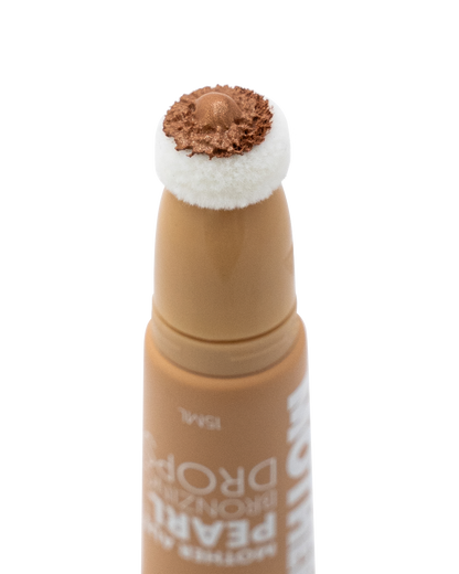 Makeup product with brown applicator on a white background